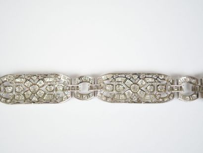 18K white gold link bracelet (750‰) and platinum...
