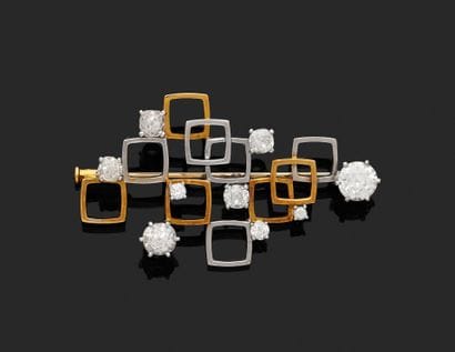 18K (750‰) yellow and white gold brooch consisting...
