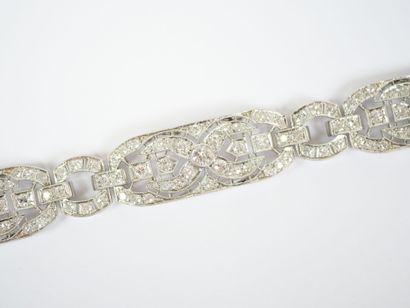 18K white gold link bracelet (750‰) and platinum...