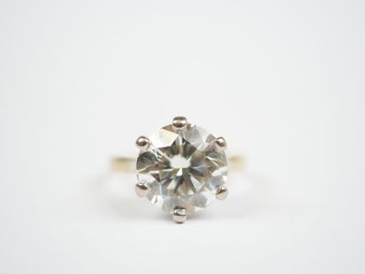 **18K white gold (750‰) solitaire ring set...