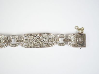 18K white gold link bracelet (750‰) and platinum...
