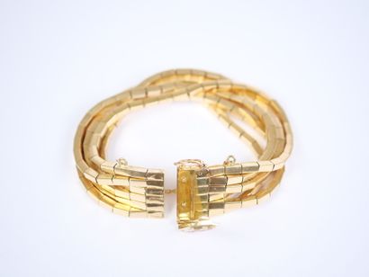 A striking 18K yellow gold (750‰) bracelet...