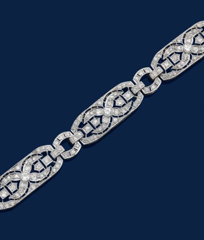 18K white gold link bracelet (750‰) and platinum...