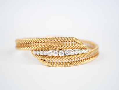 Bracelet in 18K yellow gold (750‰) and white...