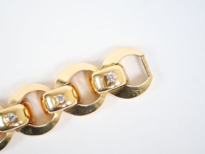 18K yellow gold (750‰) bracelet with a ring-link...