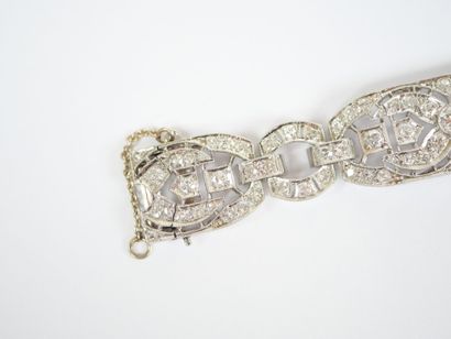 18K white gold link bracelet (750‰) and platinum...