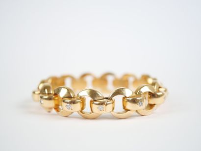 18K yellow gold (750‰) bracelet with a ring-link...