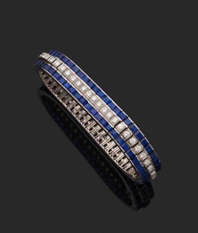 18K white gold (750‰) link bracelet entirely...