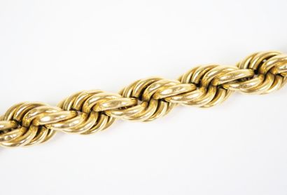 18K yellow gold (750‰) bracelet with twisted...