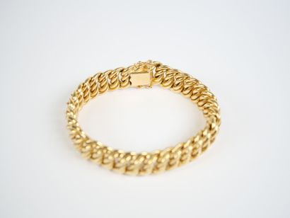 A striking 18K yellow gold (750‰) bracelet...