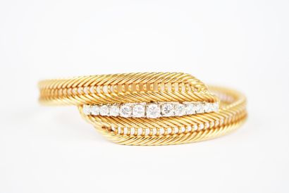 Bracelet in 18K yellow gold (750‰) and white...