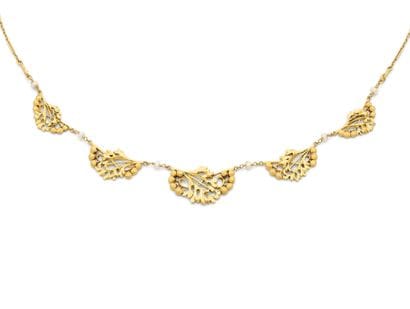 An 18K yellow gold (750‰) necklace with a...