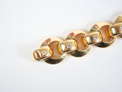 18K yellow gold (750‰) bracelet with a ring-link...