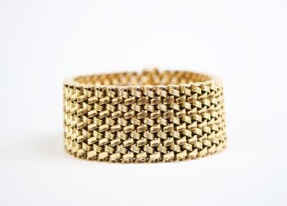 Wide 18K yellow gold (750‰) bracelet with...
