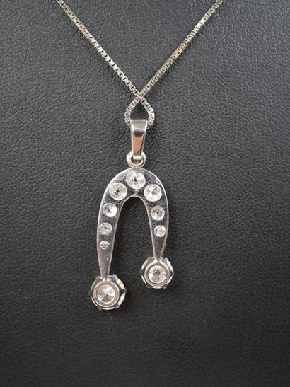 18K white gold necklace (750‰) featuring...