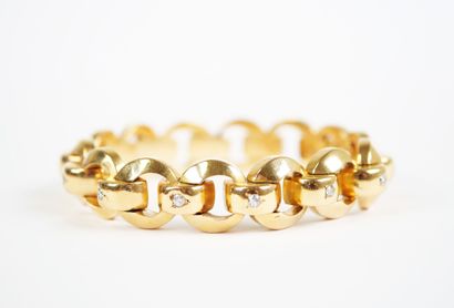18K yellow gold (750‰) bracelet with a ring-link...