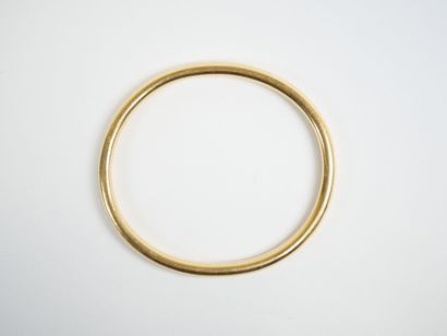 18K yellow gold (750‰) bangle. 
Weight: 27.6...