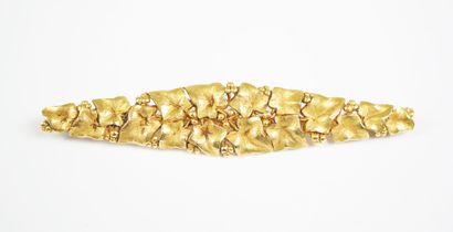 Large diamond-shaped brooch in 18K yellow...