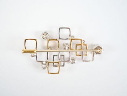 18K (750‰) yellow and white gold brooch consisting...