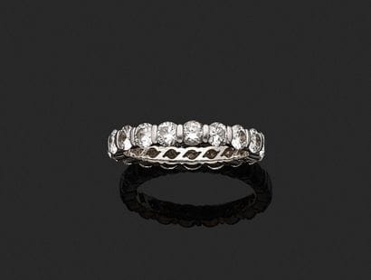 American platinum wedding band set with nineteen...