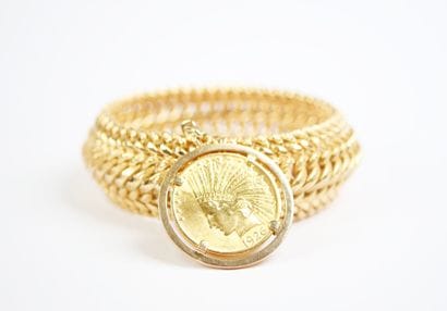 A striking 18K yellow gold (750‰) bracelet...