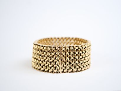 Wide 18K yellow gold (750‰) bracelet with...