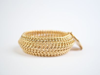 A striking 18K yellow gold (750‰) bracelet...