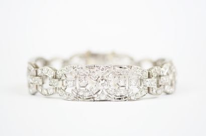 18K white gold link bracelet (750‰) and platinum...