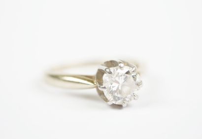 18K white gold (750‰) and platinum solitaire...