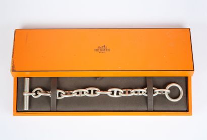 HERMÈS. 
Stately silver bracelet with an...
