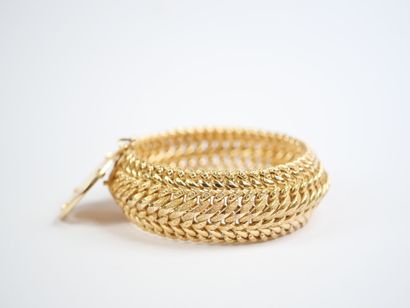 A striking 18K yellow gold (750‰) bracelet...