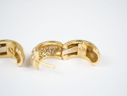 A pair of large hinged hoop earrings in 18K...