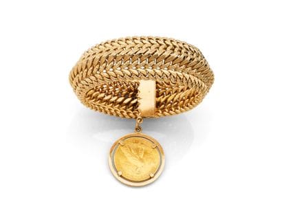 A striking 18K yellow gold (750‰) bracelet...