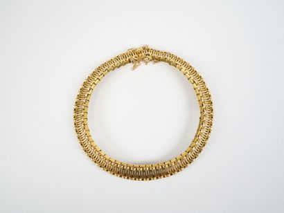 18K yellow gold (750‰) link bracelet decorated...
