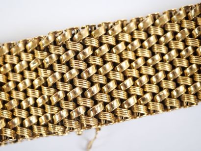 Wide 18K yellow gold (750‰) bracelet with...