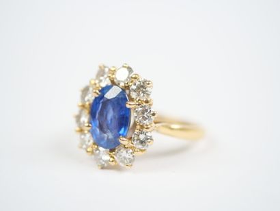 18K yellow gold (750‰) daisy ring set with...