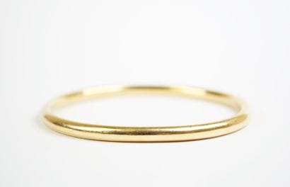 18K yellow gold (750‰) bangle. 
Weight: 27.6...
