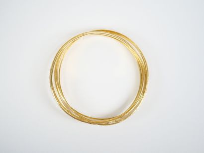 18K yellow gold (750‰) weekly bracelet consisting...