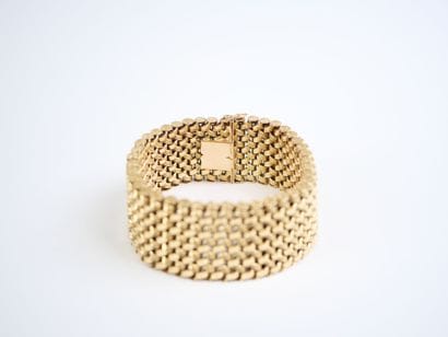 Wide 18K yellow gold (750‰) bracelet with...