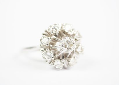 18K white gold (750‰) or platinum ring featuring...