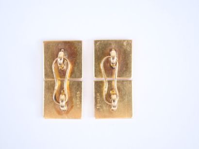 HERMÈS.
Pair of 18K yellow gold (750‰) cufflinks...