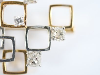 18K (750‰) yellow and white gold brooch consisting...