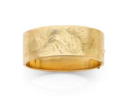 Wide, hinged bracelet in 18K yellow gold...