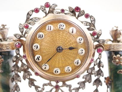 A column-style table clock with scalloped...