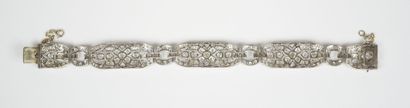 18K white gold link bracelet (750‰) and platinum...