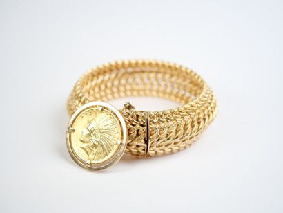 A striking 18K yellow gold (750‰) bracelet...