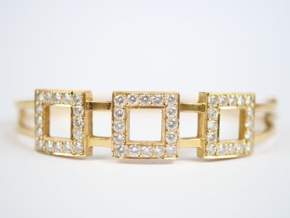 An 18K yellow gold (750‰) link bracelet featuring...