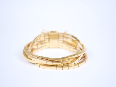 A striking 18K yellow gold (750‰) bracelet...