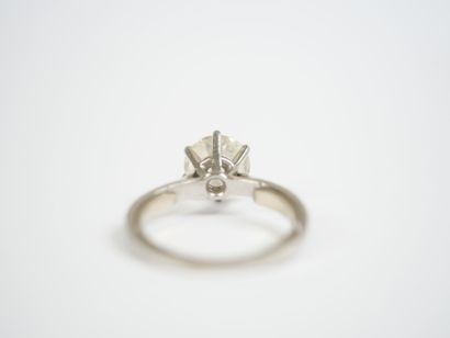 Platinum (850‰) solitaire ring featuring...