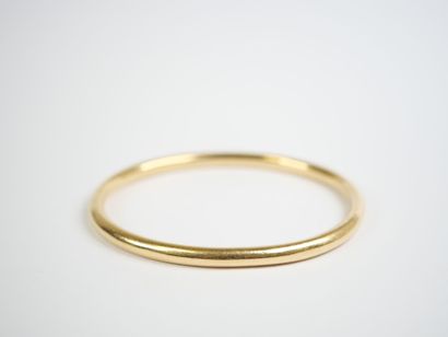 18K yellow gold (750‰) bangle. 
Weight: 27.6...